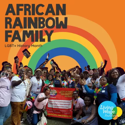 African Rainbow Family group picture in front of rainbow on orange background