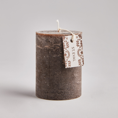 Woody brown candle on clear background