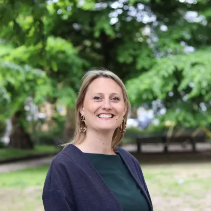 Headshot of Katherine Chapman - Director, Living Wage Foundation - in front of a tree