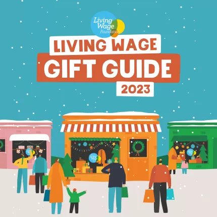 Drawing of colourful Living Wage accredited shops with people doing their festive shopping and a snowy background.