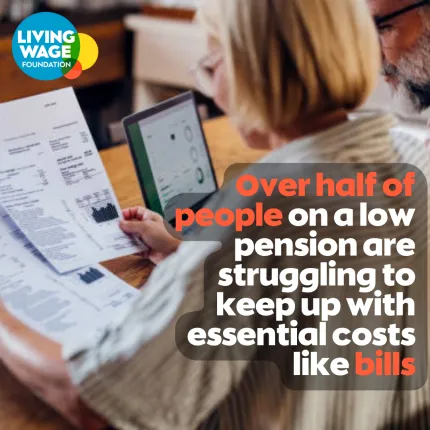 Photo of woman at the table looking through bills with text: 'Over half of people on a low pension are struggling to keep up with essential costs like bills'