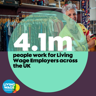 Woman who owns a clothes business smiles with a turquoise circle saying '4.1m people work for Living Wage Employers across the UK'
